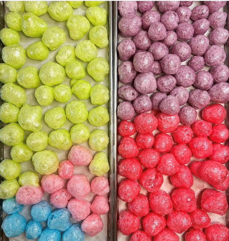 Jolly Comets freeze-dried candy in a clear pouch, showing bright fruity colors